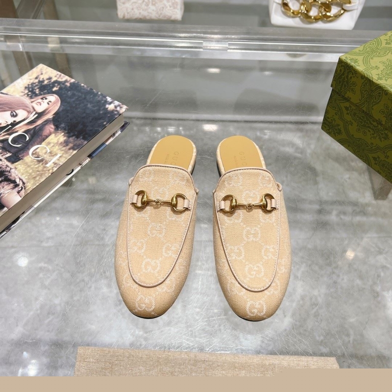 G*u*i slippers